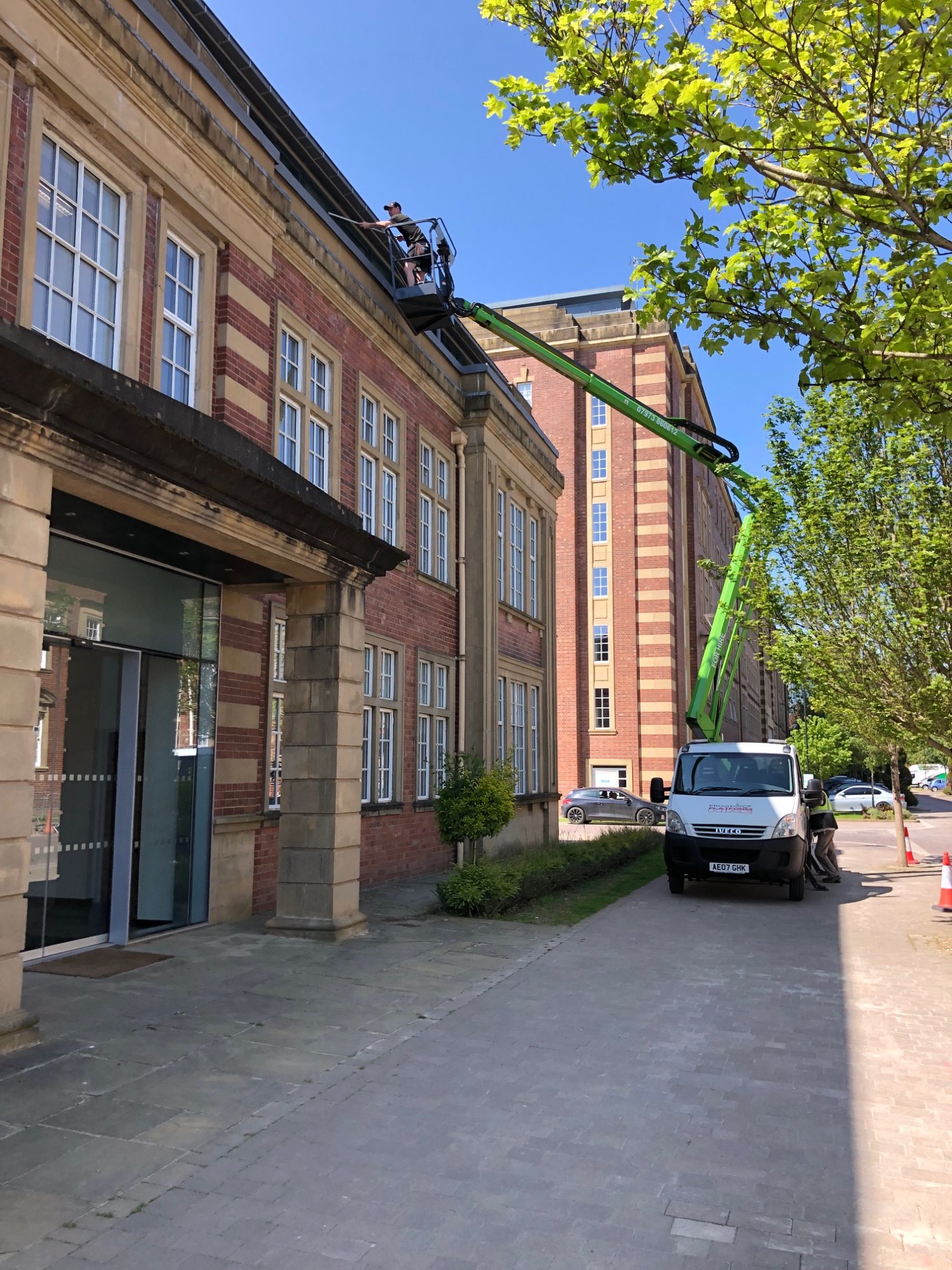 WCC Wilkinson's Cleaning cherry picker access lift gutter cleaning on commercial building York city centre